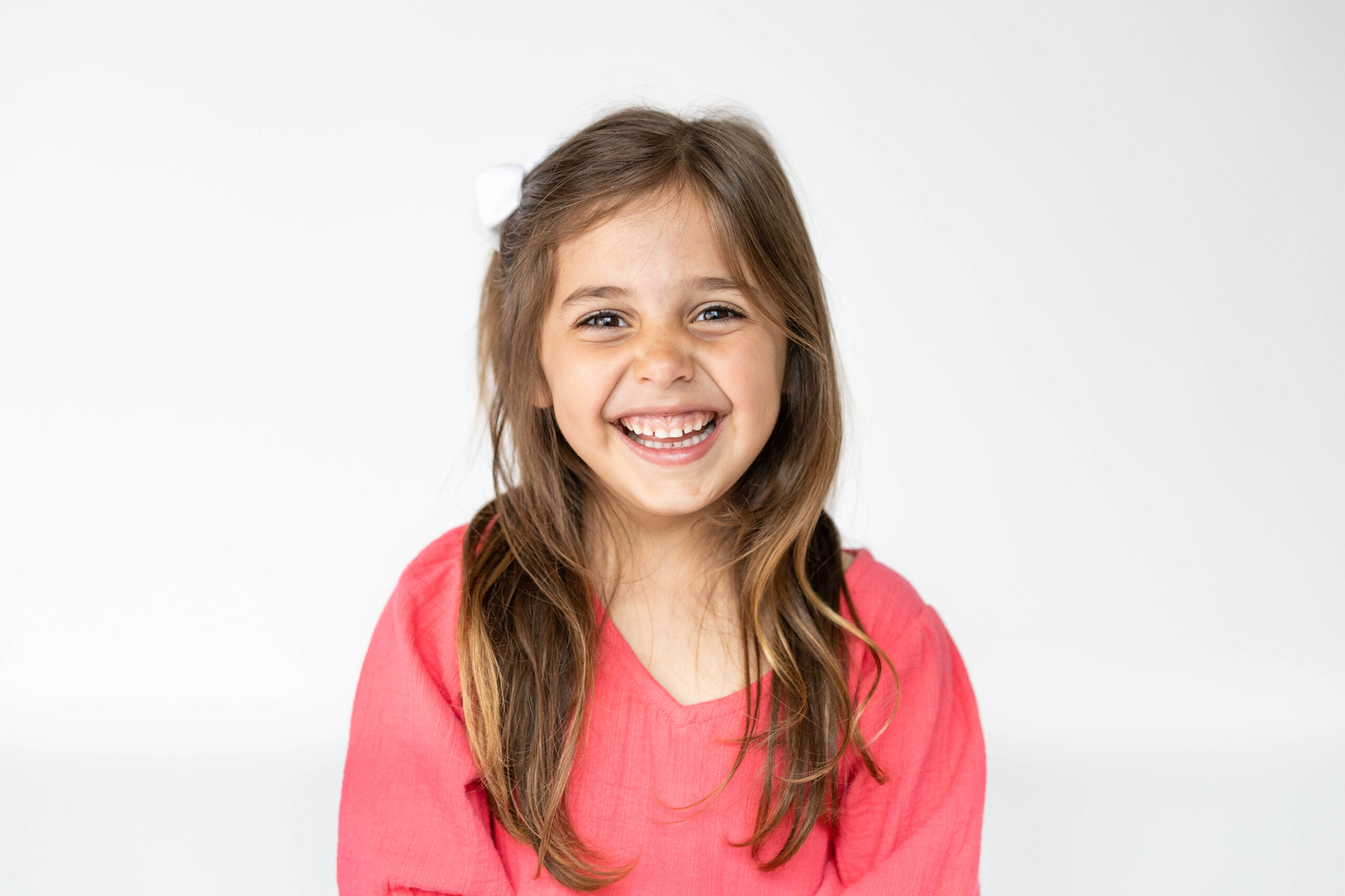 School Photo of little girl in pink shirt