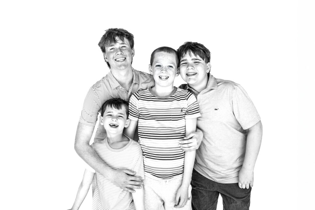 Four brothers photographed together during Personality Portrait session